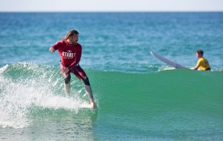 Ben Skinner surfing